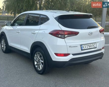 Білий Хендай Туксон, об'ємом двигуна 2 л та пробігом 89 тис. км за 16000 $, фото 4 на Automoto.ua
