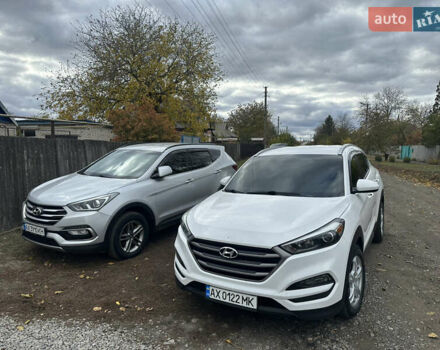Білий Хендай Туксон, об'ємом двигуна 2 л та пробігом 140 тис. км за 16500 $, фото 25 на Automoto.ua