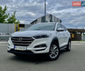Белый Хендай Туксон, объемом двигателя 2 л и пробегом 143 тыс. км за 14000 $, фото 1 на Automoto.ua