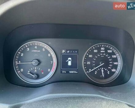 Белый Хендай Туксон, объемом двигателя 2 л и пробегом 110 тыс. км за 14000 $, фото 6 на Automoto.ua