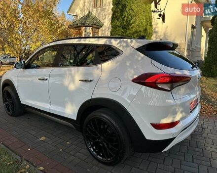 Білий Хендай Туксон, об'ємом двигуна 2 л та пробігом 148 тис. км за 22500 $, фото 5 на Automoto.ua