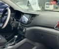 Белый Хендай Туксон, объемом двигателя 2 л и пробегом 147 тыс. км за 18740 $, фото 20 на Automoto.ua