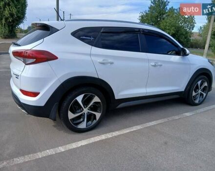 Белый Хендай Туксон, объемом двигателя 1.6 л и пробегом 106 тыс. км за 16500 $, фото 9 на Automoto.ua