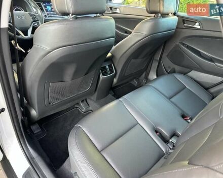 Білий Хендай Туксон, об'ємом двигуна 2 л та пробігом 148 тис. км за 22500 $, фото 48 на Automoto.ua