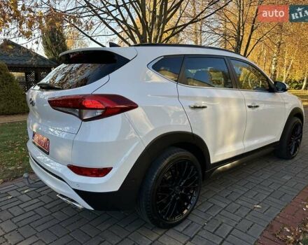 Білий Хендай Туксон, об'ємом двигуна 2 л та пробігом 148 тис. км за 22500 $, фото 10 на Automoto.ua
