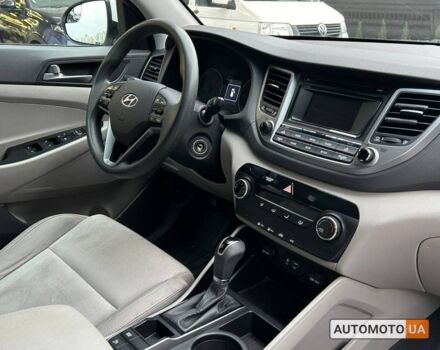 Білий Хендай Туксон, об'ємом двигуна 2 л та пробігом 120 тис. км за 14990 $, фото 13 на Automoto.ua