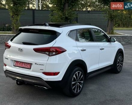 Білий Хендай Туксон, об'ємом двигуна 2 л та пробігом 175 тис. км за 18200 $, фото 3 на Automoto.ua
