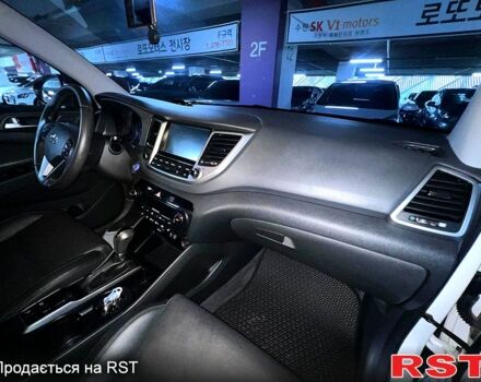 Белый Хендай Туксон, объемом двигателя 2 л и пробегом 165 тыс. км за 20700 $, фото 2 на Automoto.ua