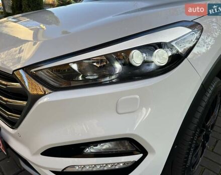 Білий Хендай Туксон, об'ємом двигуна 2 л та пробігом 148 тис. км за 22500 $, фото 78 на Automoto.ua