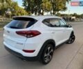 Белый Хендай Туксон, объемом двигателя 2 л и пробегом 110 тыс. км за 14000 $, фото 4 на Automoto.ua