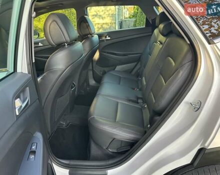 Білий Хендай Туксон, об'ємом двигуна 2 л та пробігом 148 тис. км за 22500 $, фото 46 на Automoto.ua