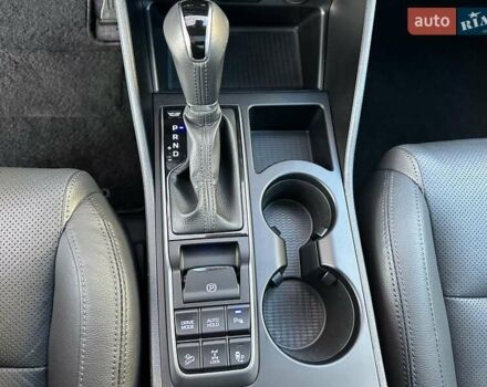 Білий Хендай Туксон, об'ємом двигуна 2 л та пробігом 148 тис. км за 22500 $, фото 28 на Automoto.ua