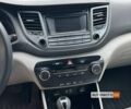 Білий Хендай Туксон, об'ємом двигуна 2 л та пробігом 120 тис. км за 14990 $, фото 12 на Automoto.ua