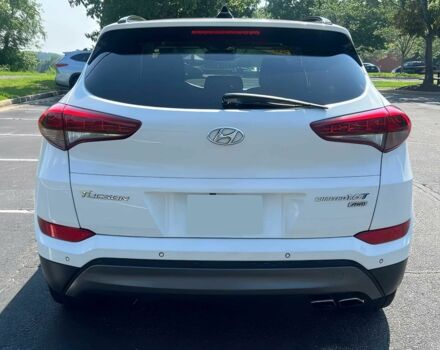 Белый Хендай Туксон, объемом двигателя 1.6 л и пробегом 79 тыс. км за 5900 $, фото 4 на Automoto.ua