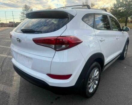 Белый Хендай Туксон, объемом двигателя 2 л и пробегом 60 тыс. км за 12200 $, фото 6 на Automoto.ua