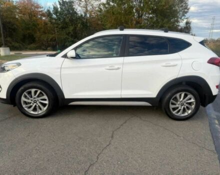 Белый Хендай Туксон, объемом двигателя 2 л и пробегом 60 тыс. км за 12200 $, фото 3 на Automoto.ua