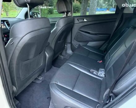 Белый Хендай Туксон, объемом двигателя 2 л и пробегом 193 тыс. км за 17890 $, фото 16 на Automoto.ua