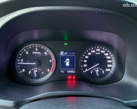 Белый Хендай Туксон, объемом двигателя 2 л и пробегом 193 тыс. км за 17890 $, фото 13 на Automoto.ua