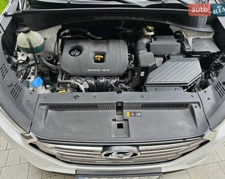 Білий Хендай Туксон, об'ємом двигуна 2 л та пробігом 80 тис. км за 20000 $, фото 14 на Automoto.ua