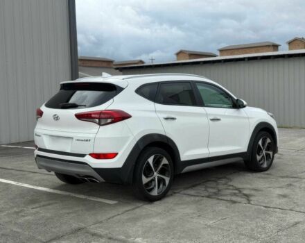 Белый Хендай Туксон, объемом двигателя 1.6 л и пробегом 50 тыс. км за 3500 $, фото 5 на Automoto.ua