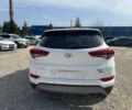 Білий Хендай Туксон, об'ємом двигуна 2 л та пробігом 82 тис. км за 15800 $, фото 5 на Automoto.ua
