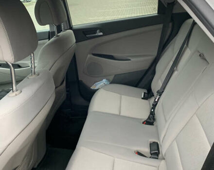 Белый Хендай Туксон, объемом двигателя 2 л и пробегом 167 тыс. км за 15800 $, фото 10 на Automoto.ua