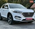 Белый Хендай Туксон, объемом двигателя 2 л и пробегом 147 тыс. км за 21299 $, фото 1 на Automoto.ua