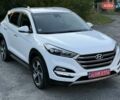 Белый Хендай Туксон, объемом двигателя 2 л и пробегом 147 тыс. км за 21299 $, фото 2 на Automoto.ua