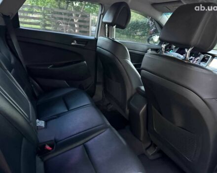 Белый Хендай Туксон, объемом двигателя 2 л и пробегом 193 тыс. км за 17890 $, фото 20 на Automoto.ua