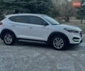Білий Хендай Туксон, об'ємом двигуна 1.98 л та пробігом 135 тис. км за 15800 $, фото 5 на Automoto.ua