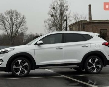 Белый Хендай Туксон, объемом двигателя 2 л и пробегом 82 тыс. км за 19000 $, фото 7 на Automoto.ua