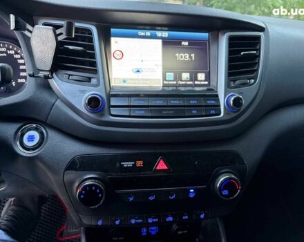 Белый Хендай Туксон, объемом двигателя 2 л и пробегом 193 тыс. км за 17890 $, фото 14 на Automoto.ua