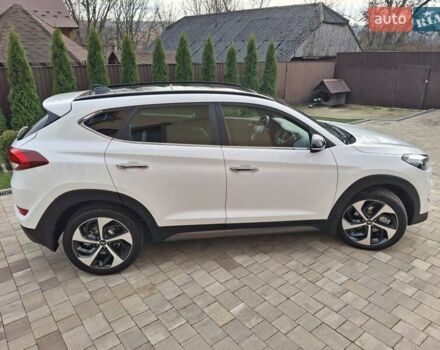 Белый Хендай Туксон, объемом двигателя 2 л и пробегом 203 тыс. км за 18700 $, фото 24 на Automoto.ua