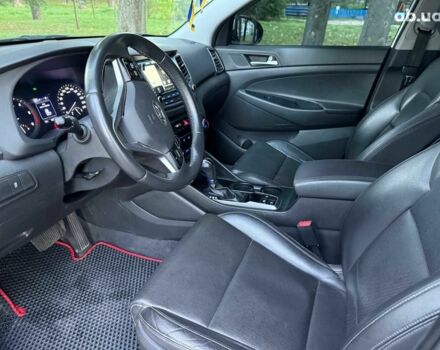 Белый Хендай Туксон, объемом двигателя 2 л и пробегом 193 тыс. км за 17890 $, фото 12 на Automoto.ua