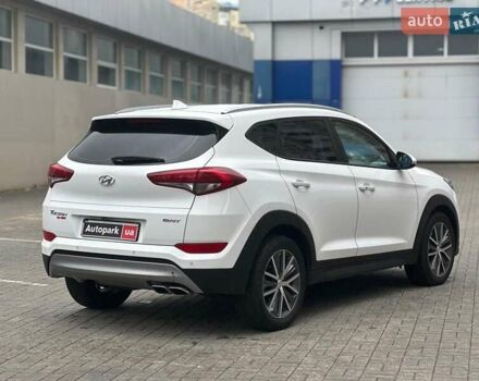 Белый Хендай Туксон, объемом двигателя 2 л и пробегом 175 тыс. км за 22990 $, фото 4 на Automoto.ua