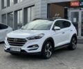 Білий Хендай Туксон, об'ємом двигуна 2 л та пробігом 107 тис. км за 19400 $, фото 1 на Automoto.ua