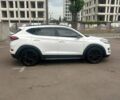 Белый Хендай Туксон, объемом двигателя 1.59 л и пробегом 150 тыс. км за 17000 $, фото 1 на Automoto.ua