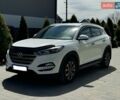 Белый Хендай Туксон, объемом двигателя 2 л и пробегом 286 тыс. км за 15400 $, фото 1 на Automoto.ua