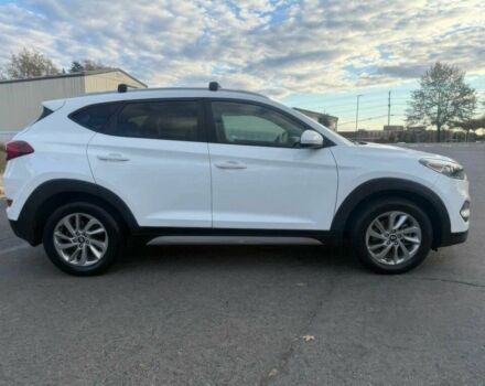 Белый Хендай Туксон, объемом двигателя 2 л и пробегом 60 тыс. км за 12200 $, фото 7 на Automoto.ua