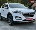 Белый Хендай Туксон, объемом двигателя 2 л и пробегом 147 тыс. км за 21299 $, фото 1 на Automoto.ua