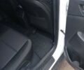 Білий Хендай Туксон, об'ємом двигуна 2 л та пробігом 115 тис. км за 16300 $, фото 11 на Automoto.ua