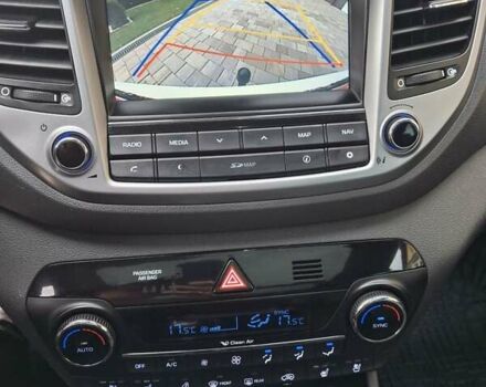 Белый Хендай Туксон, объемом двигателя 2 л и пробегом 203 тыс. км за 18700 $, фото 7 на Automoto.ua