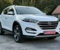 Белый Хендай Туксон, объемом двигателя 2 л и пробегом 147 тыс. км за 21299 $, фото 1 на Automoto.ua