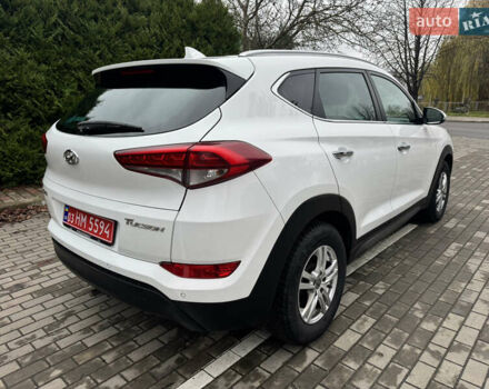 Белый Хендай Туксон, объемом двигателя 1.69 л и пробегом 178 тыс. км за 12800 $, фото 10 на Automoto.ua