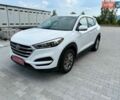 Белый Хендай Туксон, объемом двигателя 2 л и пробегом 178 тыс. км за 14400 $, фото 1 на Automoto.ua