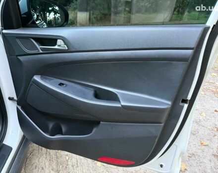 Белый Хендай Туксон, объемом двигателя 2 л и пробегом 193 тыс. км за 17890 $, фото 21 на Automoto.ua