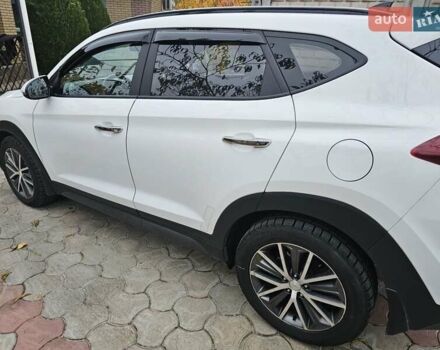 Белый Хендай Туксон, объемом двигателя 2 л и пробегом 187 тыс. км за 24000 $, фото 27 на Automoto.ua