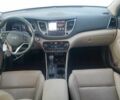 Белый Хендай Туксон, объемом двигателя 2 л и пробегом 129 тыс. км за 10800 $, фото 7 на Automoto.ua