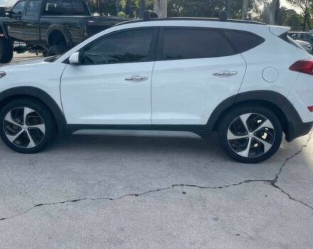 Білий Хендай Туксон, об'ємом двигуна 1.6 л та пробігом 40 тис. км за 12100 $, фото 4 на Automoto.ua