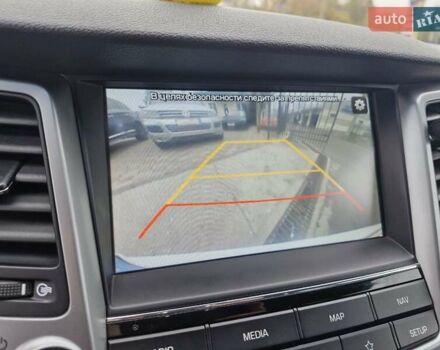 Белый Хендай Туксон, объемом двигателя 2 л и пробегом 111 тыс. км за 19999 $, фото 25 на Automoto.ua